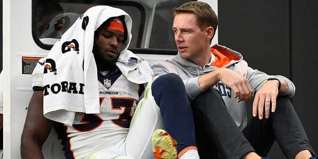 Denver Broncos running back Javonte Williams (33) is carted off the field during the second half of a game against the Las Vegas Raiders Oct. 2, 2022, in Las Vegas.  