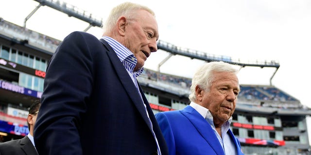 Dallas Cowboys owner Jerry Jones and New England Patriots owner Robert Kraft talk before their game at Gillette Stadium on October 17, 2021 in Foxborough, Massachusetts.