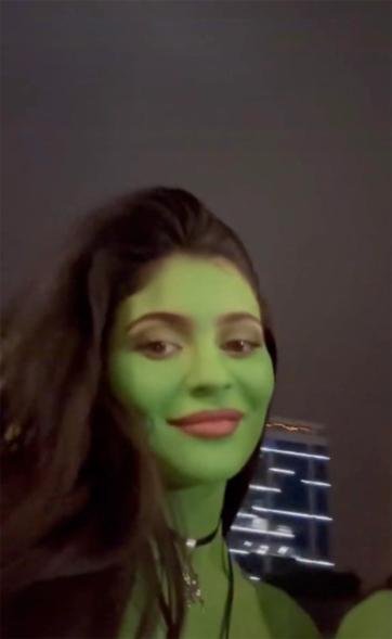 Kylie Jenner went green with ghoulish glee alongside friend Hailey Bieber.