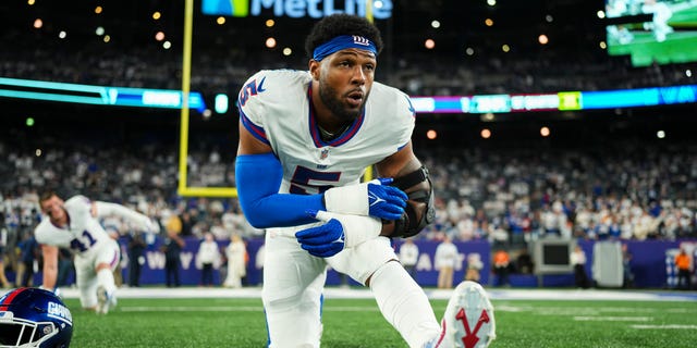 Kayvon Thibodeaux of the New York Giants stretches before the game against the Dallas Cowboys at MetLife Stadium on Sept. 26, 2022, in East Rutherford, New Jersey.