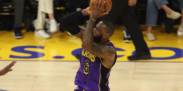 LeBron James #6 of the Los Angeles Lakers shoots a three point basket during the season opener game against the Golden State Warriors on Oct. 18, 2022 at Chase Center in San Francisco, California.