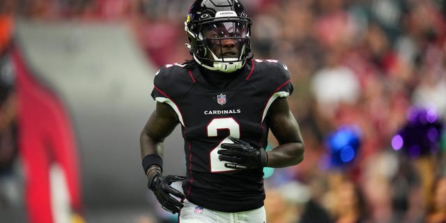 Marquise Brown of the Arizona Cardinals runs out during introductions against the Philadelphia Eagles at State Farm Stadium Oct. 9, 2022, in Glendale, Ariz.