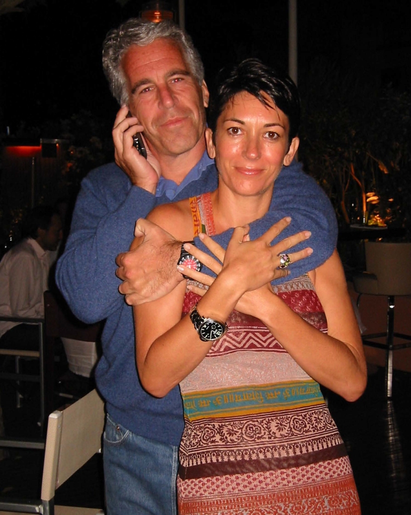 Late pedophile Jeffrey Epstein hugs his convicted madam, Ghislaine Maxwell, in photo used in her trial.