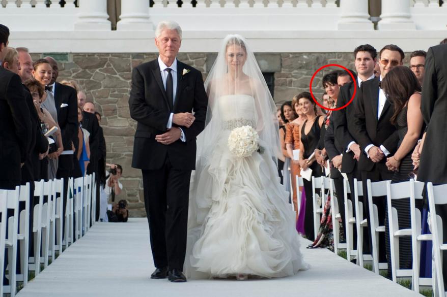 Ghislaine Maxwell looks on as Bill Clinton walks daughter Chelsea down the aisle in 2010.