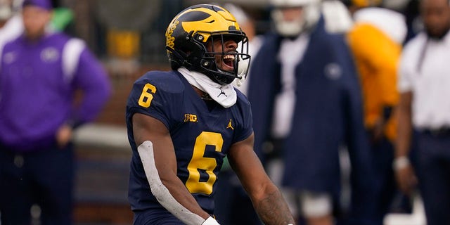 Michigan defensive back R.J. Moten (6) celebrates a stop against Penn State in the second half of an NCAA college football game in Ann Arbor, Mich., Saturday, Oct. 15, 2022.