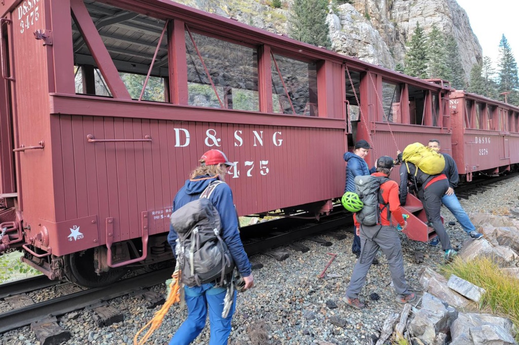 A pair of the train's staff who also had medical training crossed the freezing river and waited with the hiker for the Silverton Medical Rescue team.