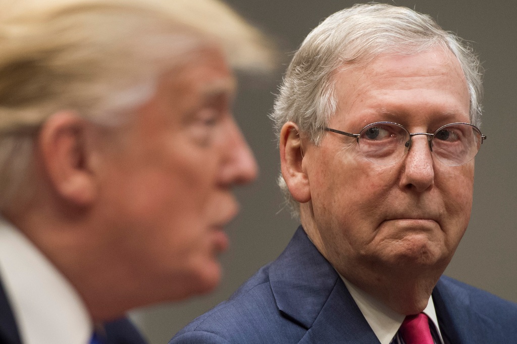 US President Donald Trump speaks alongside Senate Majority Leader Mitch McConnell (R), as they hold a meeting about tax reform in the Roosevelt Room of the White House in Washington, DC, September 5, 2017.