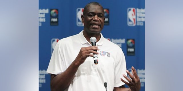 Dikembe Mutombo speaks during the opening ceremony of Basketball without Borders Africa in Johannesburg, South Africa. 