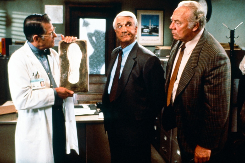 From left: George Kennedy, Leslie Nielsen and Ed Williams in "Naked Gun 2 1/2: The Smell of Fear."