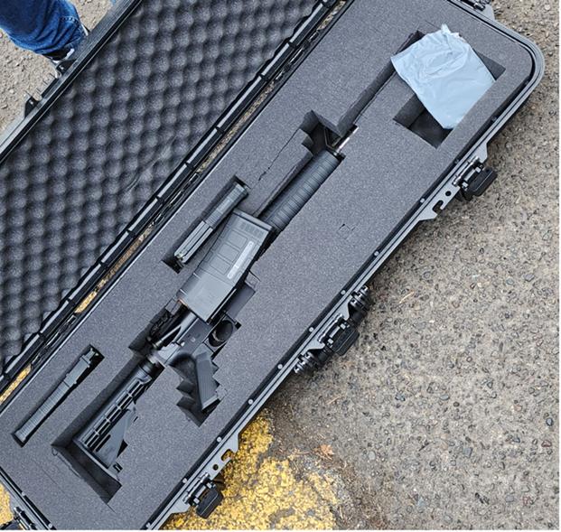 A gun inside its case.