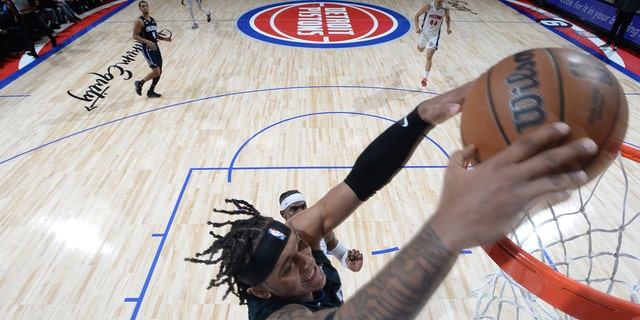 Paolo Banchero of the Orlando Magic dunks during a game against the Detroit Pistons Oct. 19, 2022, at Little Caesars Arena in Detroit.