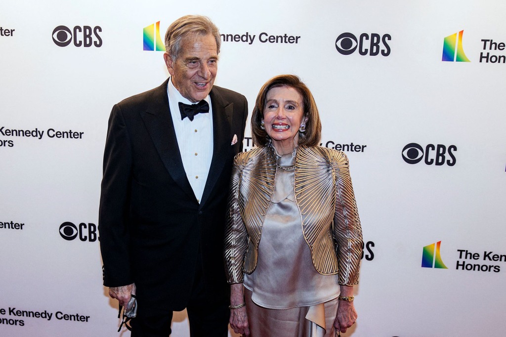 In this file photo taken on December 05, 2021, US Speaker of the House of Representatives Nancy Pelosi (R) and husband Paul Pelosi attend the 44th Kennedy Center Honors at the Kennedy Center in Washington, DC.
