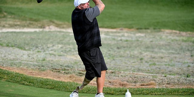 Marine Veteran Chris Nowak tees off during the PGA Hope event at Congressional Country Club October 17, 2022 in Bethesda, MD. PGA Hope has specialized golf  programs for veterans dealing with PTSD, brain injuries or other issues.