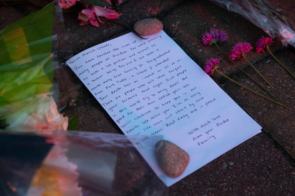 Purdue University students leave notes and flowers at Varun Manish Chheda’s vigil on Oct. 5, 2022.