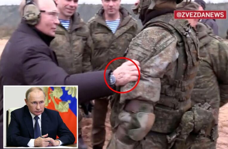 Putin seen with ‘IV track marks’ on hand amid cancer rumors