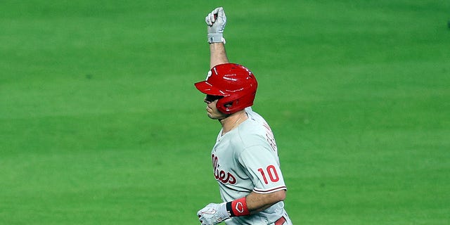 J.T. Realmuto #10 of the Philadelphia Phillies rounds the bases after hitting a home run in the 10th inning against the Houston Astros in Game One of the 2022 World Series at Minute Maid Park on October 28, 2022 in Houston, Texas.