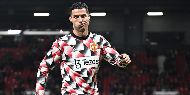 Manchester United striker Cristiano Ronaldo warms up before an English Premier League soccer game against Tottenham Hotspur at Old Trafford in Manchester, England, October 19, 2022.