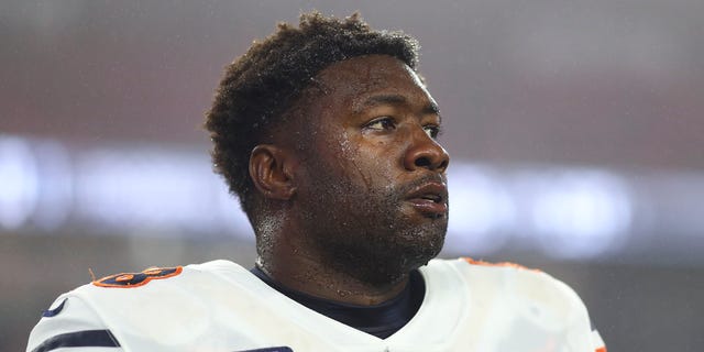 Roquan Smith #58 of the Chicago Bears stretches prior to an NFL football game against the New England Patriots at Gillette Stadium on October 24, 2022 in Foxborough, Massachusetts.