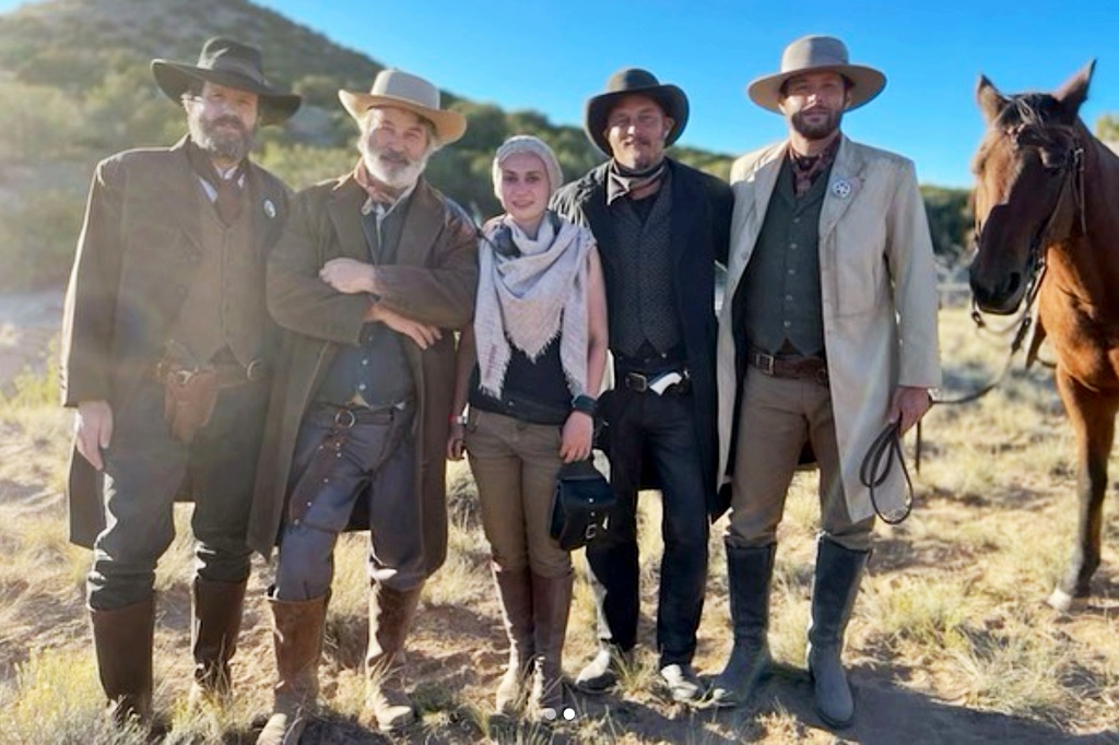 From left-to-right, Josh Hopkins, Alec Baldwin, Halyna Hutchins, Travis Fimmel and Jensen Ackles on the set of the movie "Rust" before Hutchins was tragically shot and killed. 