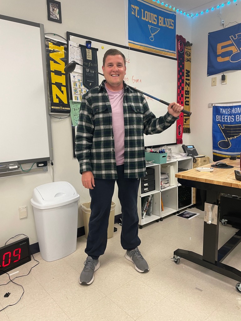 Brent Pearson, a student council advisor at Eureka High School in Missouri, dressed as Sandler in "Happy Gilmore."