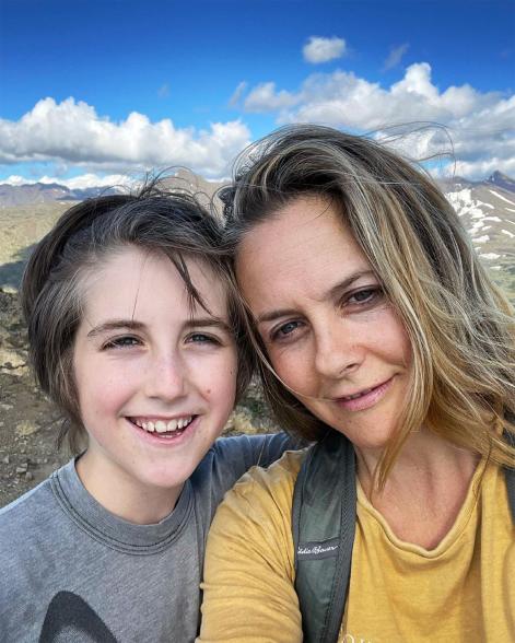 After receiving backlash for sharing a bed with her 11-year-old son, Silverstone called herself a "natural mama" who loved raising her kid the natural way.