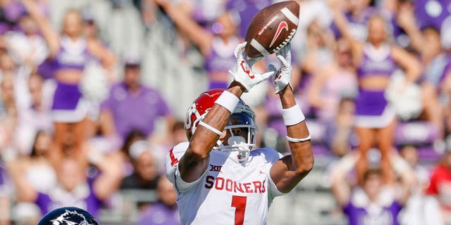 Oklahoma Sooners wide receiver Jayden Gibson catches a pass over TCU Horned Frogs cornerback Tre'Vius Hodges-Tomlinson during a game Oct. 1, 2022, at Amon G. Carter Stadium in Fort Worth, Texas.