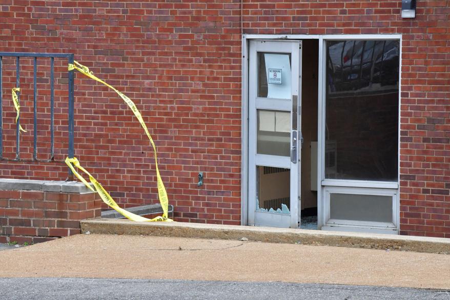 Broken glass in the entrance on the north side of the Central Visual and Performing Arts High School