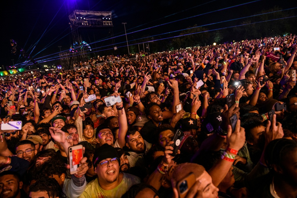 The crowd watches as Travis Scott performs at Astroworld Festival at NRG park on Friday, Nov. 5, 2021.