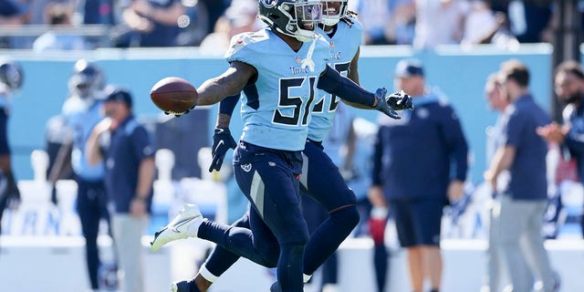 David Long Jr. #51 of the Tennessee Titans reacts after making an interception against the Indianapolis Colts during the first half at Nissan Stadium on October 23, 2022, in Nashville, Tennessee. 