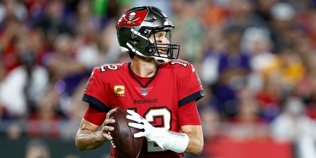 Tom Brady #12 of the Tampa Bay Buccaneers looks to pass against the Baltimore Ravens during the second quarter at Raymond James Stadium on October 27, 2022 in Tampa, Florida. 