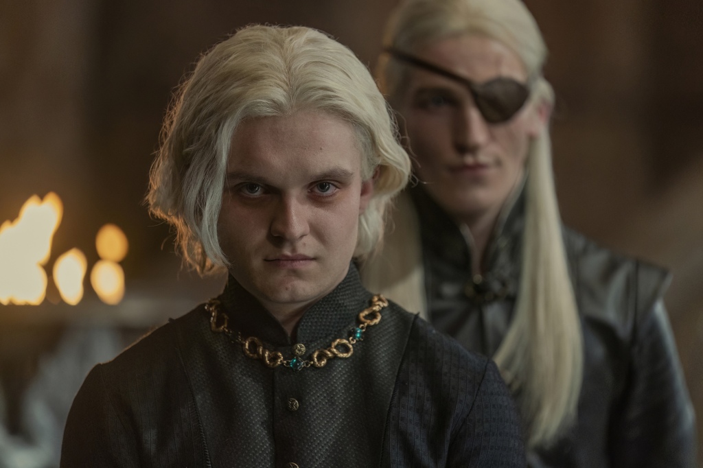 Tom Glynn-Carney as Aegon and Ewan Mitchell as his brother, Aemond (right). 