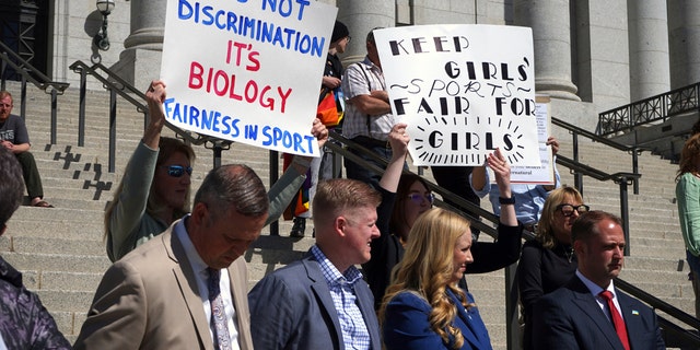 Lawmakers listen as parents speak about the prospect of their children competing against transgender girls in school sports at the Utah State Capitol