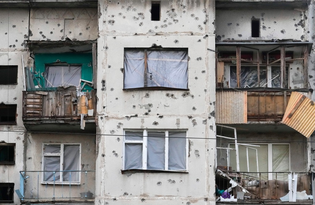 A building in Ukraine pockmarked by shrapnel from Russia rockets in the Donetsk region on Oct. 29.