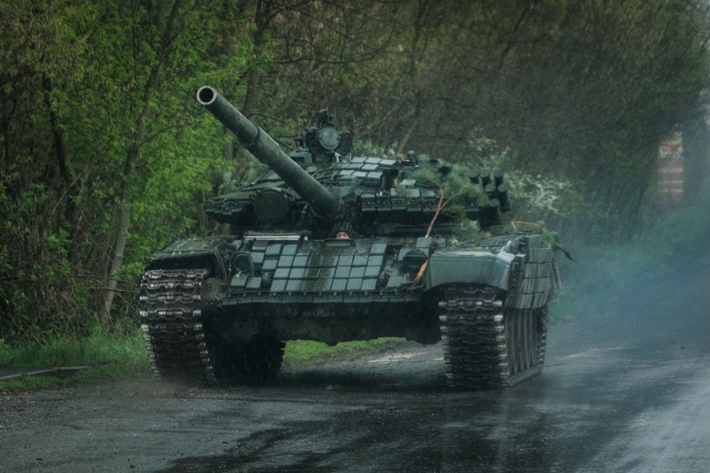 A Ukrainian T-72 tank runs on a road near Lyman, eastern Ukraine.