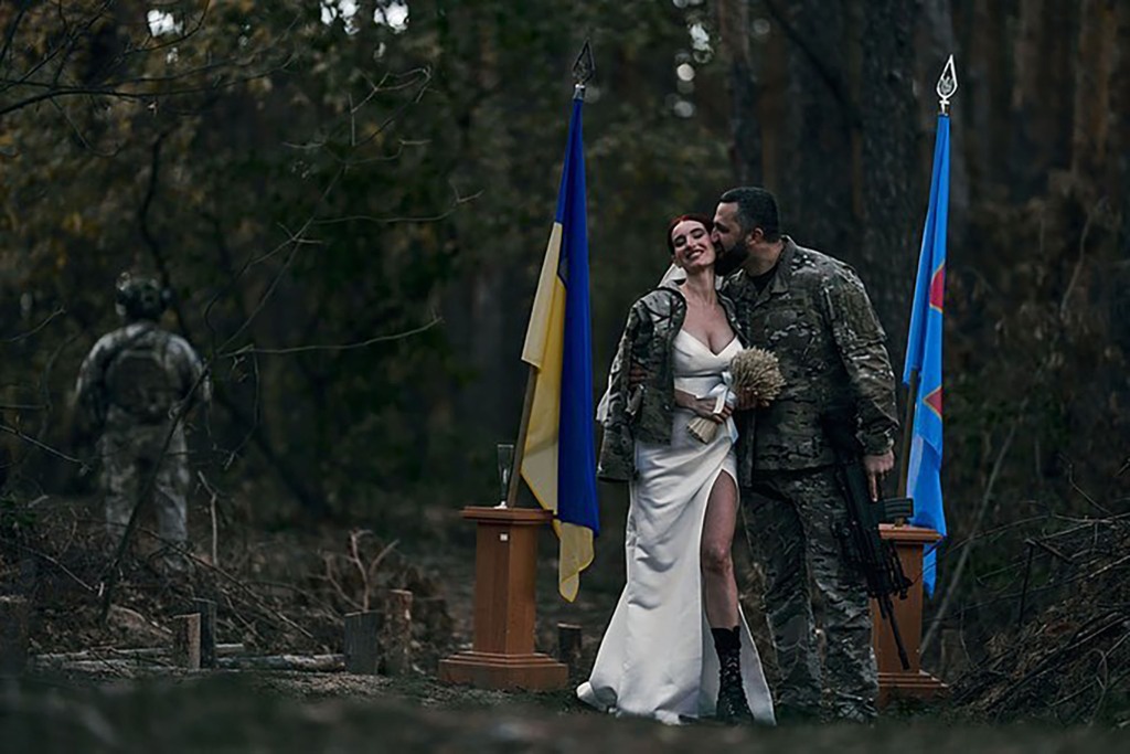 Evgenia Emerald and fellow soldier Evgeniy Stipanyuk at their wedding