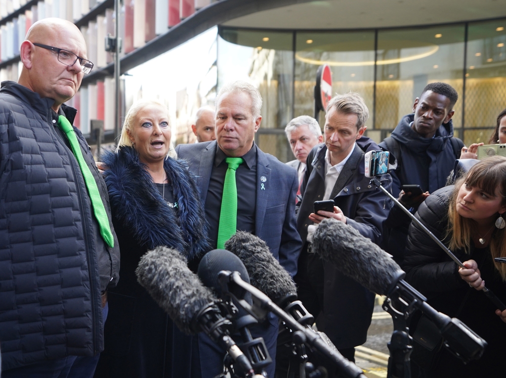 The family of Harry Dunn, (left to right) father Tim Dunn, mother Charlotte Charles and stepfather Bruce Charles talk to the media outside the Old Bailey in London Thursday. 