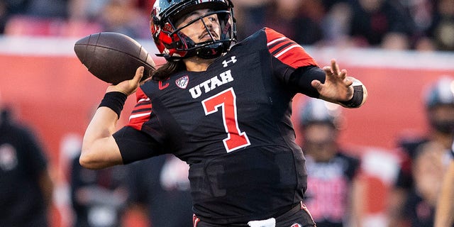 Cameron Rising #7 of the Utah Utes throws a pass against the USC Trojans during the first half of their game October 15, 2022 Rice-Eccles Stadium in Salt Lake City Utah. 