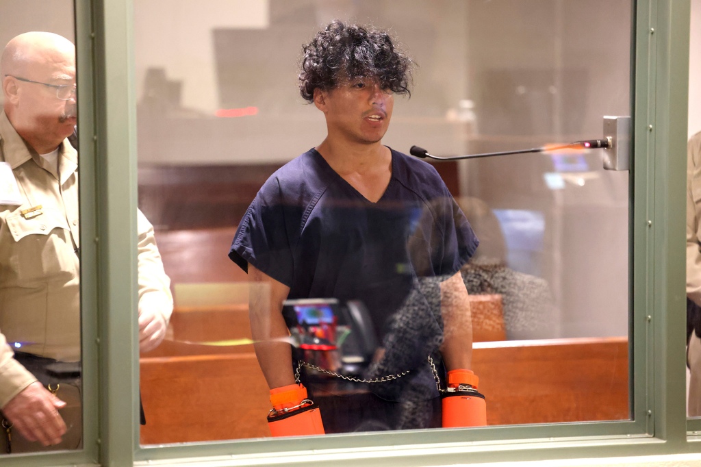 Las Vegas Strip stabbing spree suspect Yoni Barrios makes his initial court appearance at the Regional Justice Center in Las Vegas, Friday, Oct. 7, 2022. Barrios will be charged with murder, the region's top prosecutor said Friday. (K.M. Cannon/Las Vegas Review-Journal via AP)