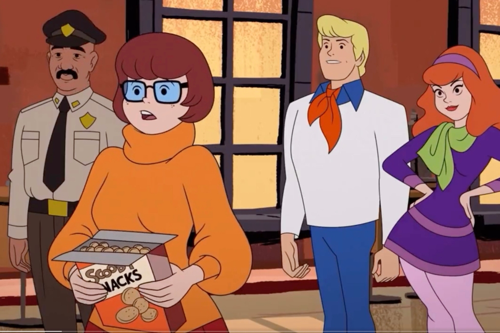 A still from the new flick is seen above. Velma appears alongside other original characters including Fred (second from right) and Daphne (far right). 