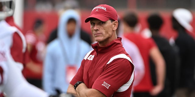 Head coach Brent Venables of the Oklahoma Sooners watches the team during warmups before a game against the Nebraska Cornhuskers at Memorial Stadium Sept. 17, 2022, in Lincoln, Neb.