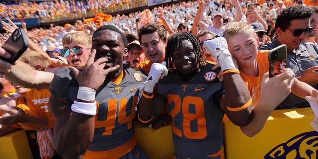 The Tennessee Volunteers and fans celebrate after a win over the LSU Tigers at Tiger Stadium on Oct. 8, 2022, in Baton Rouge, Louisiana.