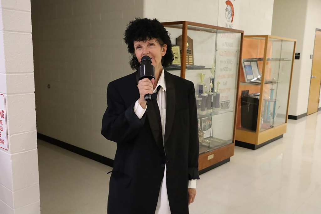 McHenry Community High School attendance clerk Nancy Shea dressed as Sandler's "The Wedding Singer" character.