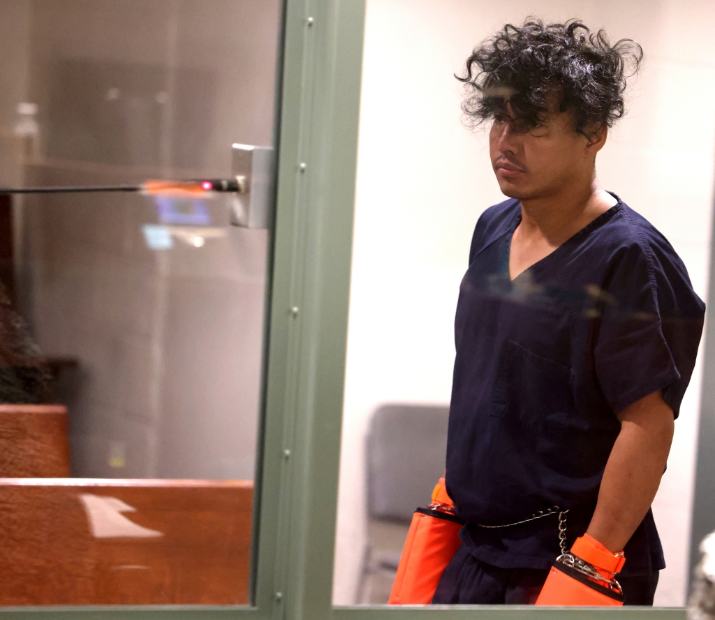 Las Vegas Strip stabbing spree suspect Yoni Barrios makes his initial court appearance at the Regional Justice Center in Las Vegas, Friday, Oct. 7, 2022. Barrios will be charged with murder, the region's top prosecutor said Friday. (K.M. Cannon/Las Vegas Review-Journal via AP)