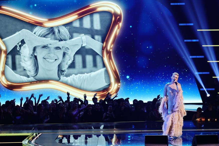 Pink performs a tribute song for Olivia Newton-John during the 2022 American Music Awards in Los Angeles, Calif on Nov. 20, 2022.