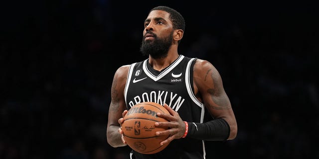 Kyrie Irving, #11 of the Brooklyn Nets, prepares to shoot a free throw during the game against the Dallas Mavericks on Oct. 27, 2022 at Barclays Center in Brooklyn, New York.  