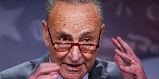 Senate Majority Leader Chuck Schumer, D-N.Y., speaks with reporters following a closed-door caucus lunch, at the Capitol in Washington, Tuesday, July 19, 2022. 