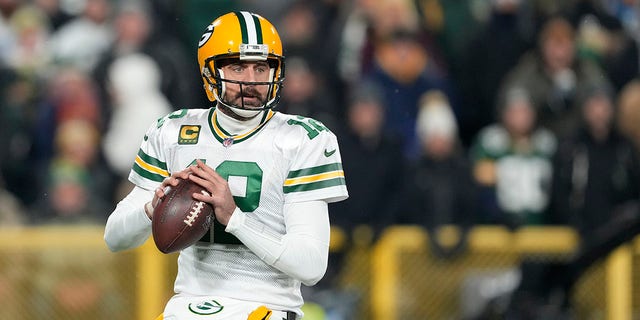 Aaron Rodgers of the Packers looks to pass against the Tennessee Titans at Lambeau Field on Nov. 17, 2022, in Green Bay, Wisconsin.