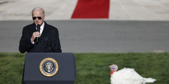 US President Joe Biden speaks after pardoning the National Thanksgiving Turkey during a ceremony on the South Lawn of the White House in Washington, DC, US, on Monday, Nov. 21, 2022. The National Thanksgiving Turkey and its alternate were raised near Monroe, North Carolina, and today's ceremony marks the 75th anniversary of the presentation. Photographer: Ting Shen/Bloomberg via Getty Images