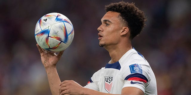 Antonee Robinson of USA prepares to take a throw in during the FIFA World Cup Qatar 2022 Group B match between USA and Wales at Ahmad Bin Ali Stadium on November 21, 2022, in Doha, Qatar. 