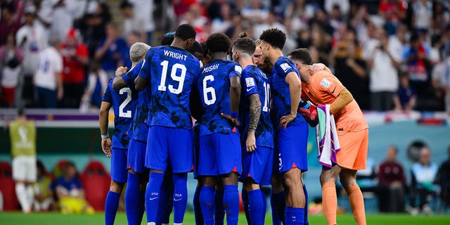 UMNT players huddle at the beginning of the second half during their FIFA World Cup Qatar 2022 Group B match against England at Al Bayt Stadium in Al Khor, Qatar, on Friday.